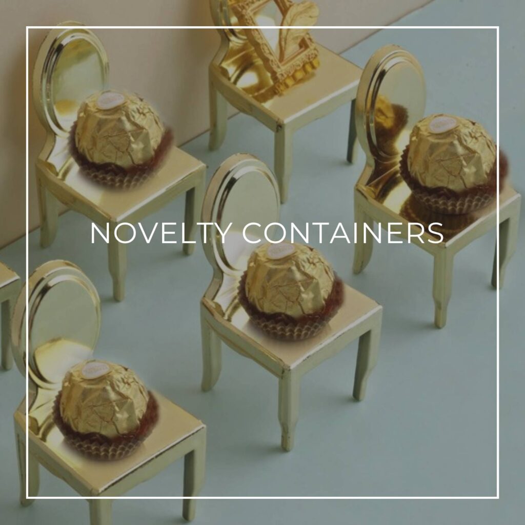 bite size chocolate truffles served on individual miniature gold chair food display containers