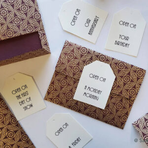 decorative envelopes and tags for 'Open When' letters for different occasions
