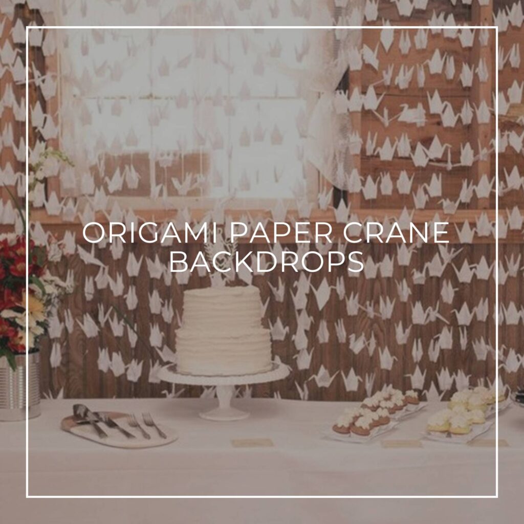 origami paper crane garland backdrop to a party dessert table