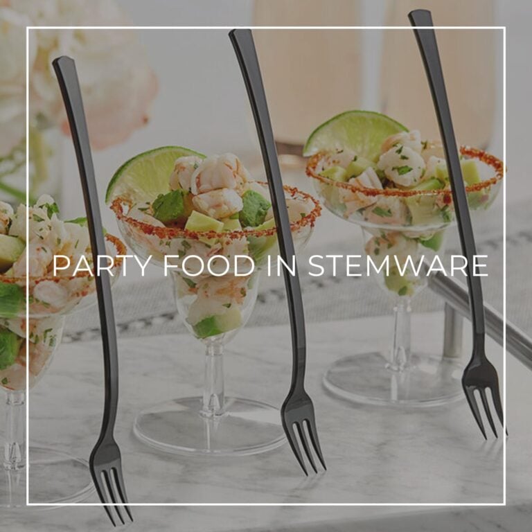 Stemware title image with shrimp and avocado ceviche in a chili-salt-rimmed glass, garnished with lime and mini forks
