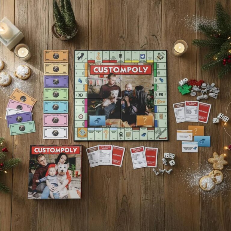 Custom Monopoly board with family photo of dad, baby, and dog, set among Christmas candles and cookies