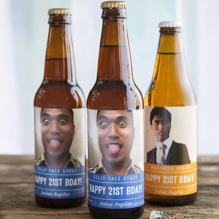 Three beer bottles labeled "Silly Face Stout" and "Business Brew, Happy 21st BDAY!" with photos of the same man making a funny face and a formal portrait