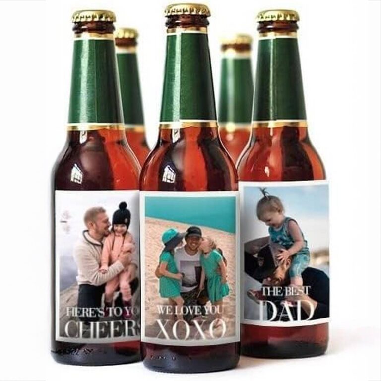 Three green-neck beer bottles with photo labels reading "Here's to You Cheers," "We Love You XOXO," and "The Best Dad" over family beach photos