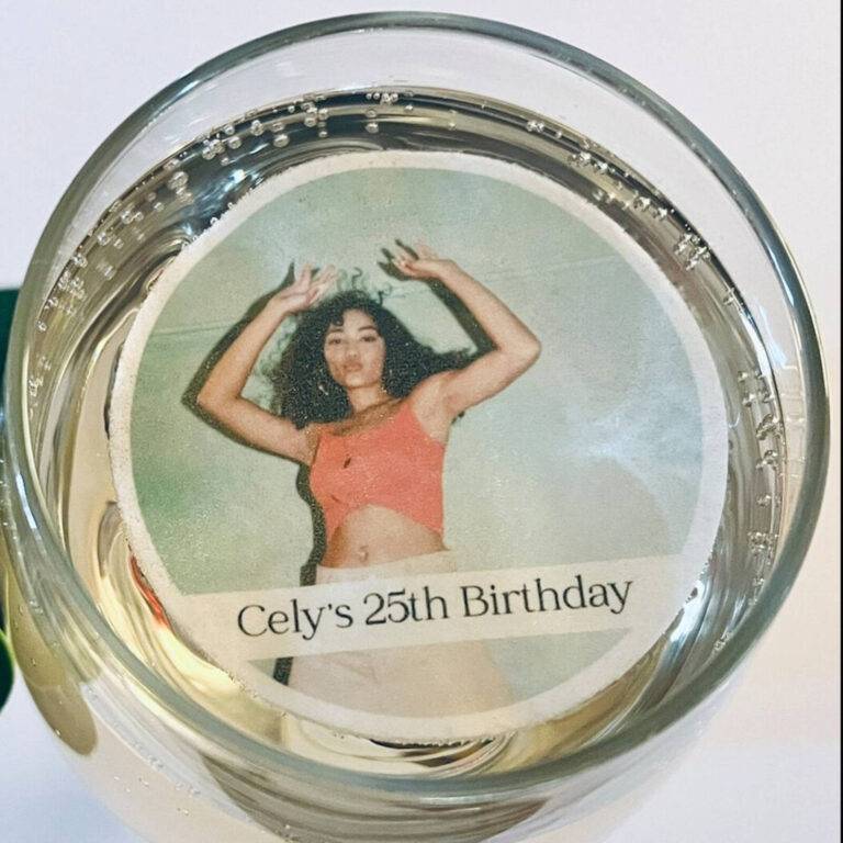 Edible photo drinks topper with birthday photo in a mint green cocktail