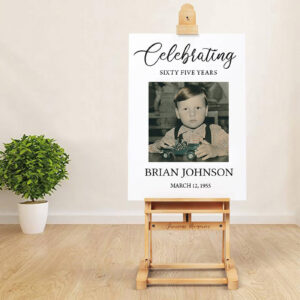 Celebrating 65 Years photo sign showing an old photo of the birthday boy as a child