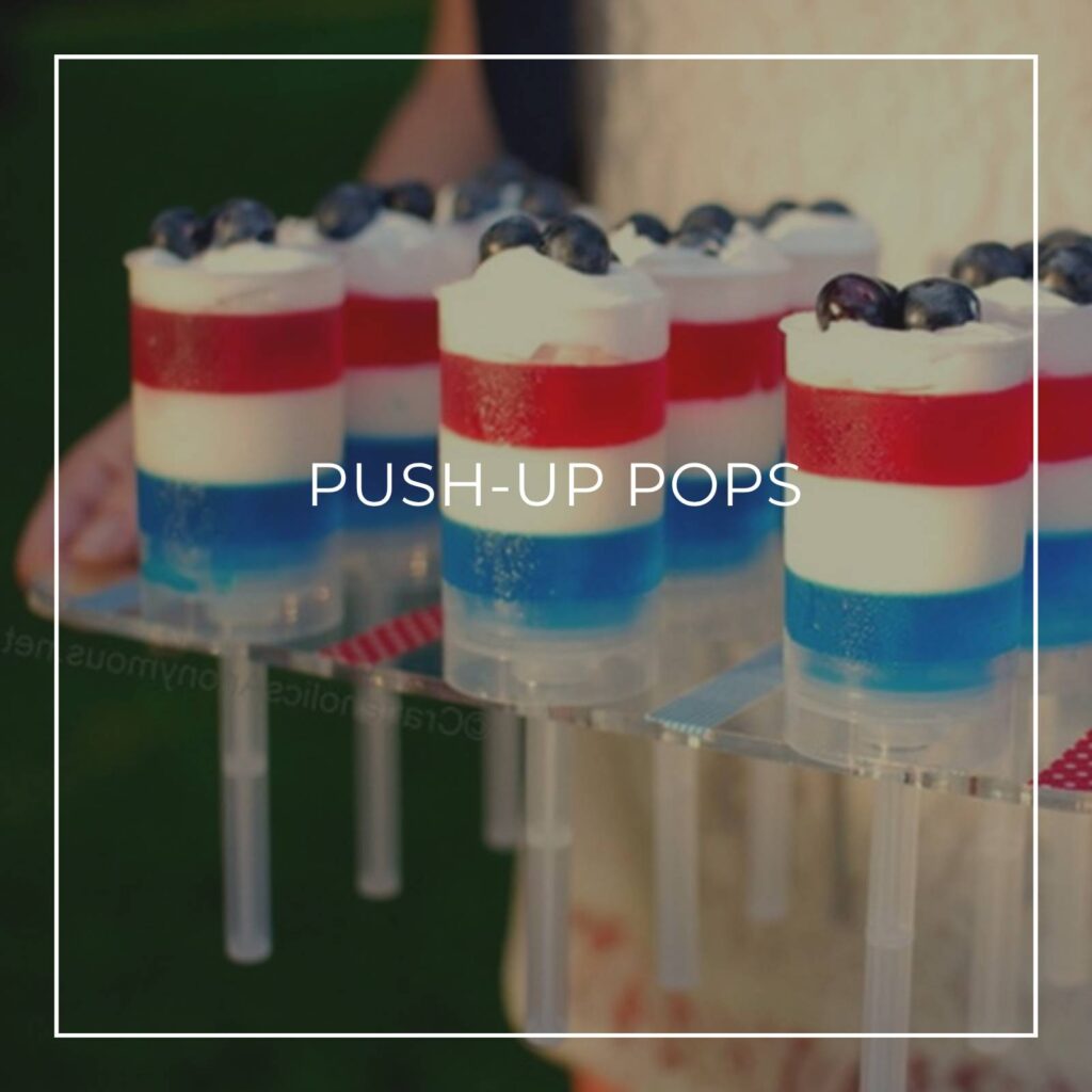 red, white, and blue desserts served in push-up pop containers