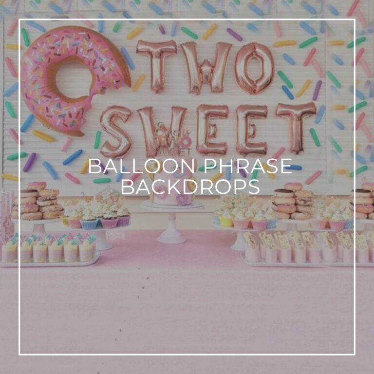 Two Sweet spelled out with pink letter balloons as a backdrop to a party dessert table