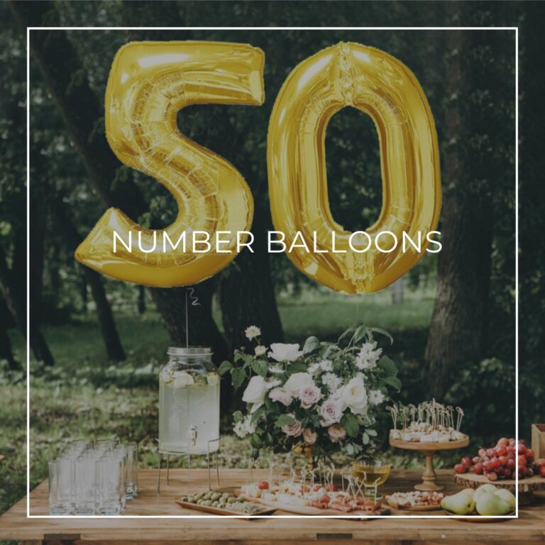 giant number balloons spelling 1966 above a dessert table for a suprise birthday party