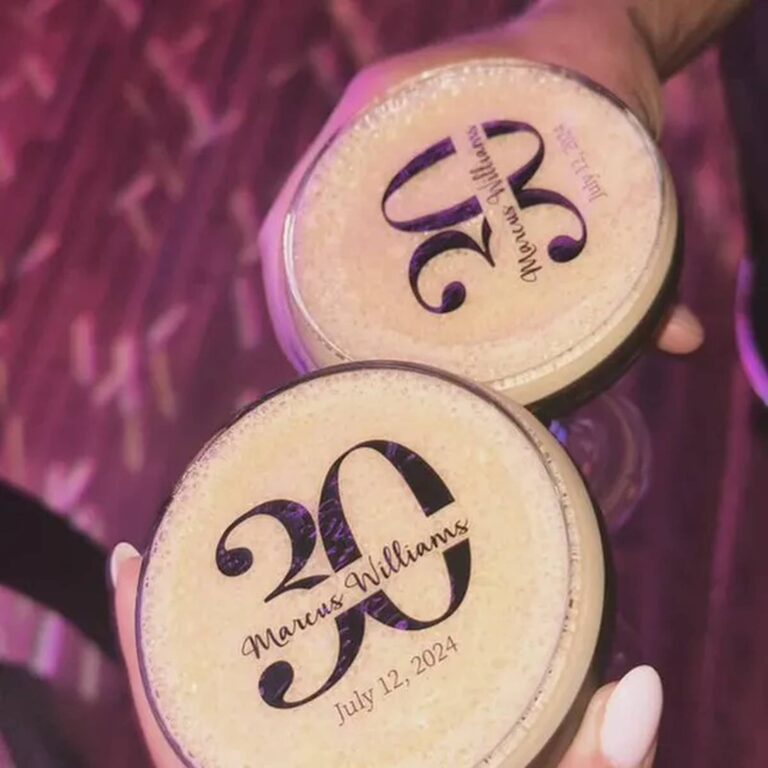 Edible numeral toppers reading "3" and "20" with cursive names on foam-topped drinks