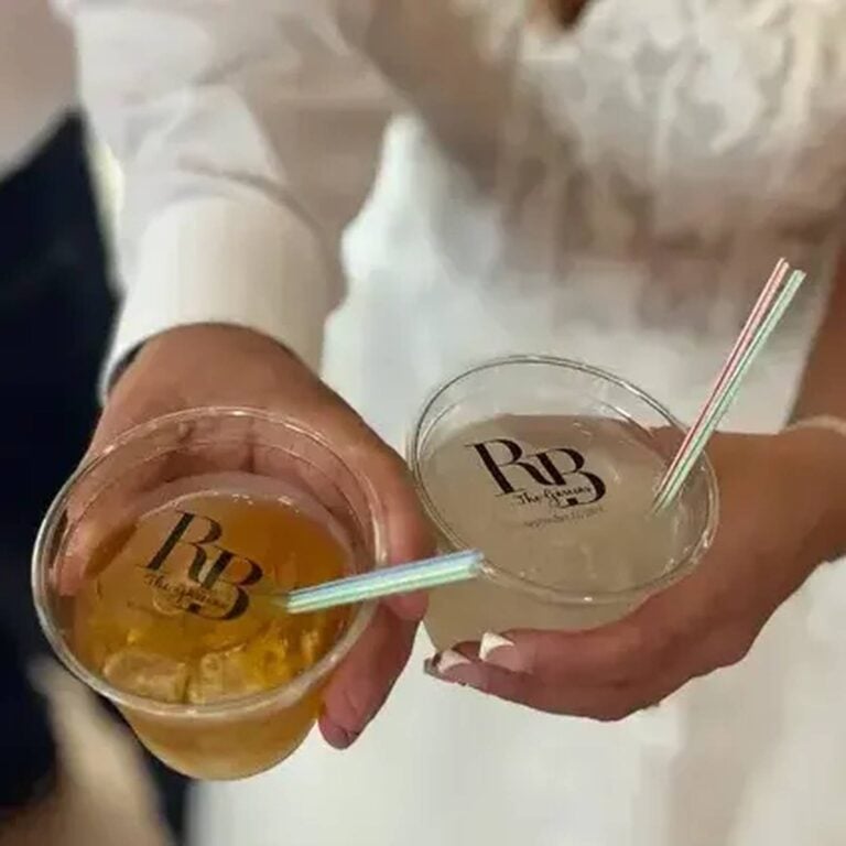 Edible monogram topper reading "S/D, The Johnsons, May 25 2024" on a cocktail