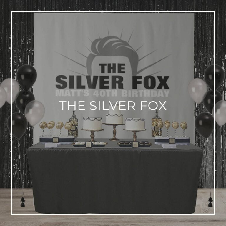 The Silver Fox custom 65th birthday party backdrop and black foil fringe curtain behind a birthday dessert table